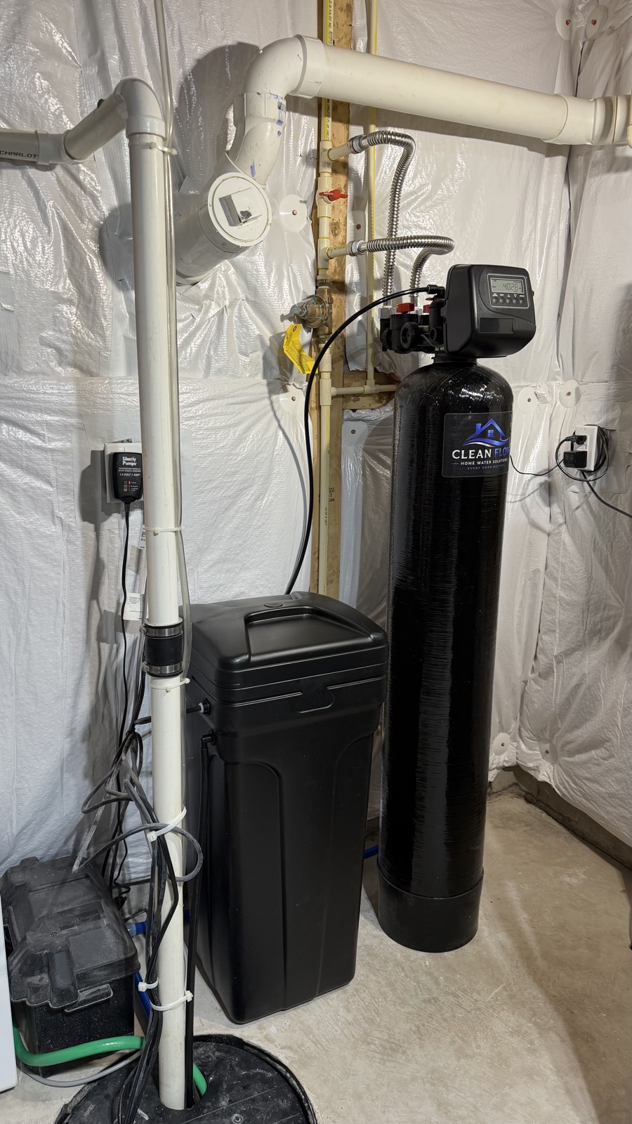 A Clean Flow system and brine tank installed in a basement